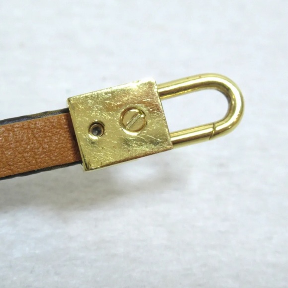 Louis Vuitton luxury bracelet with adorable luggage charm!! - Picture 9 of 11